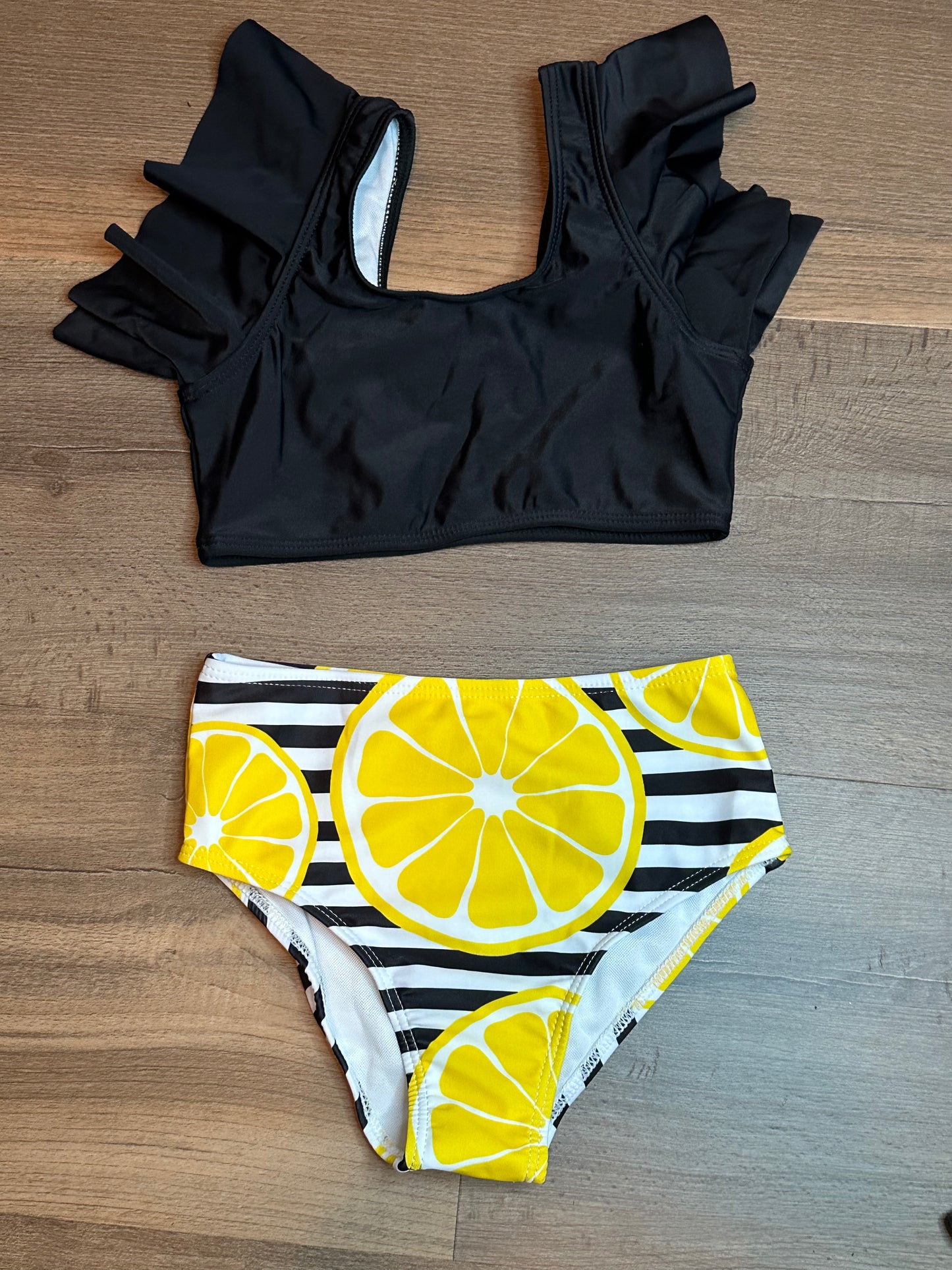 Girls black and lemon swimsuit