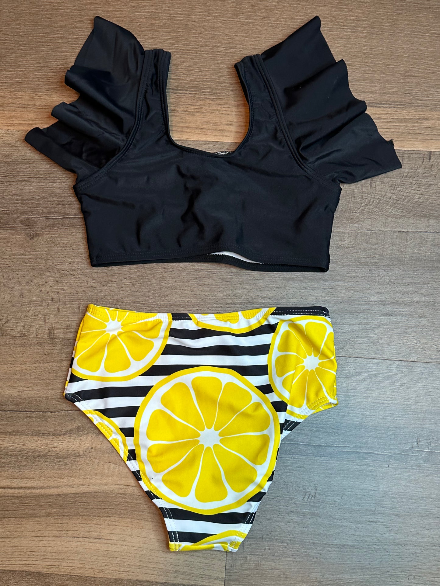Girls black and lemon swimsuit